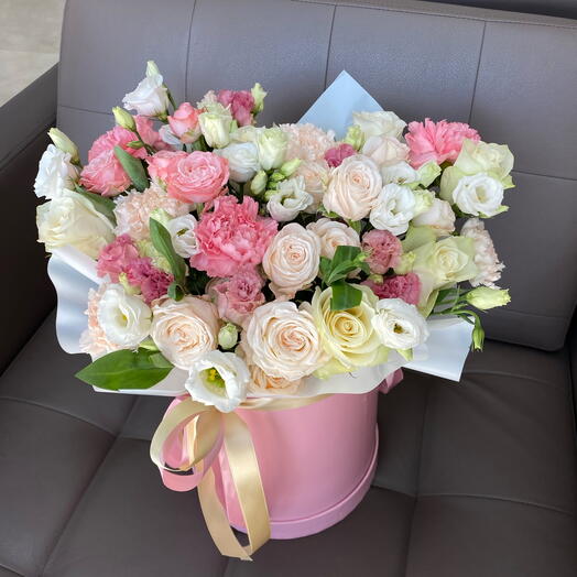 Flowers in a box with ribbons