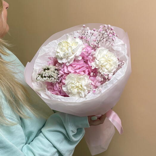 Delicate bouquet with pink hydrangea and gypsophila