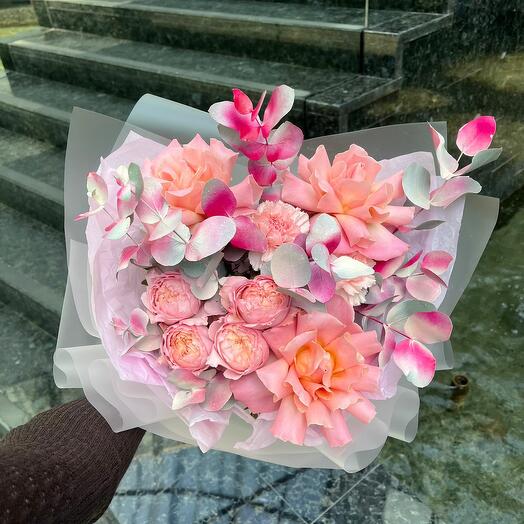 Bouquet of peony-shaped roses, carnations and eucalyptus