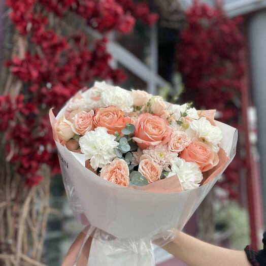A composite bouquet of roses and dianthuses