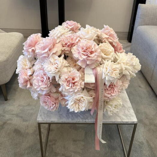 Basket of white and pink roses