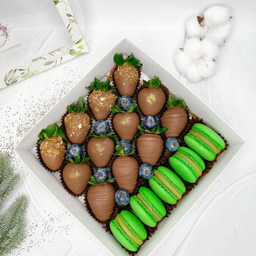 Chocolate covered strawberries with macarons