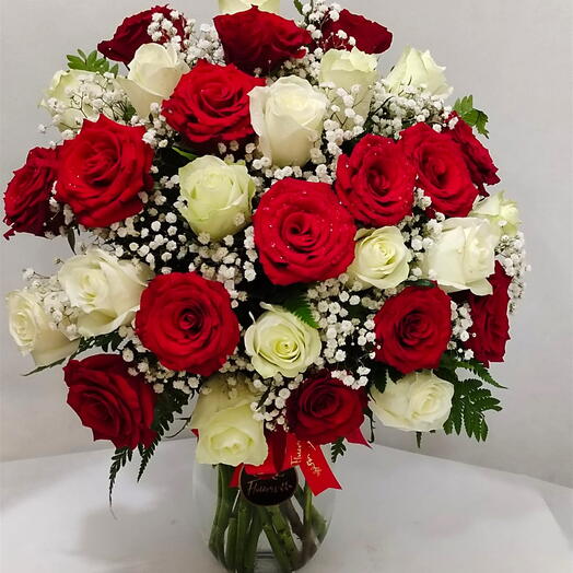 30 Stems of red and white roses arrangement in a vase