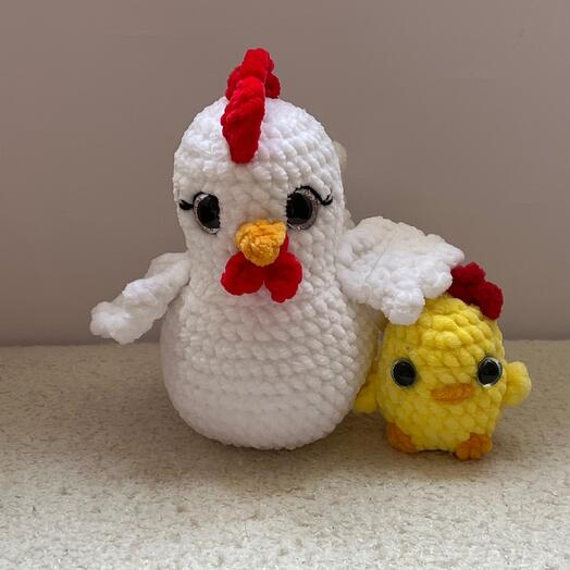 Plush chicken with a chick