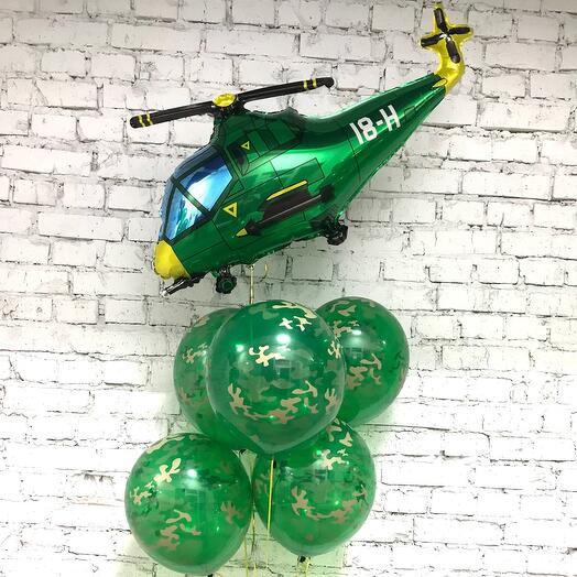 A fountain of camouflage balloons and a turntable
