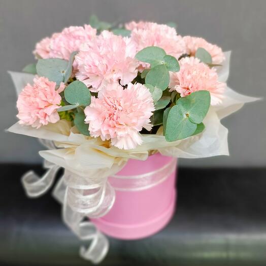 Pink dianthus in a hatbox