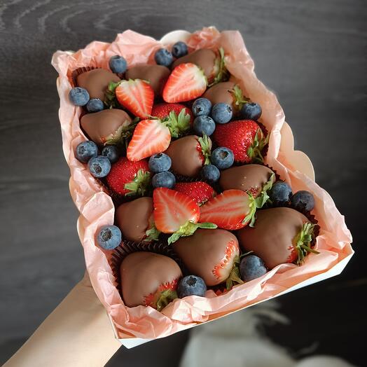 Chocolate-covered strawberries with blueberries