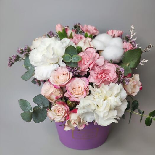 Flowers in a lavender box with white dianthus, cotton and bushy pink