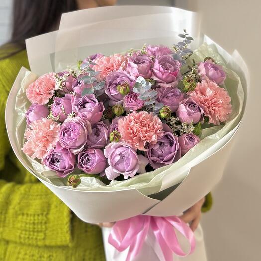 Bouquet of lavender bush roses and pink dianthus with eucalyptus