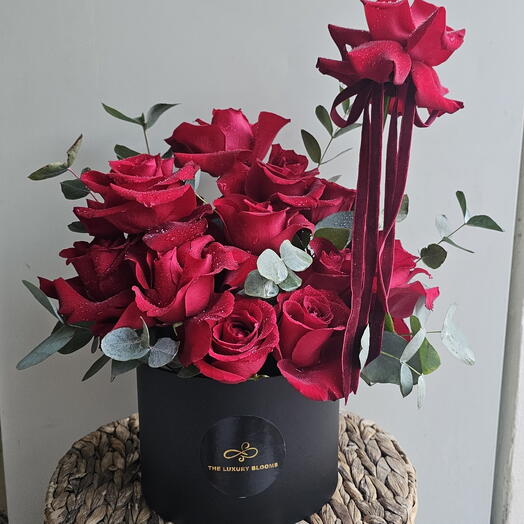 Red Roses in Black Hatbox