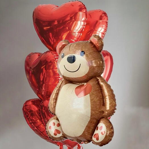 Large teddy bear and 7 hearts helium balloons