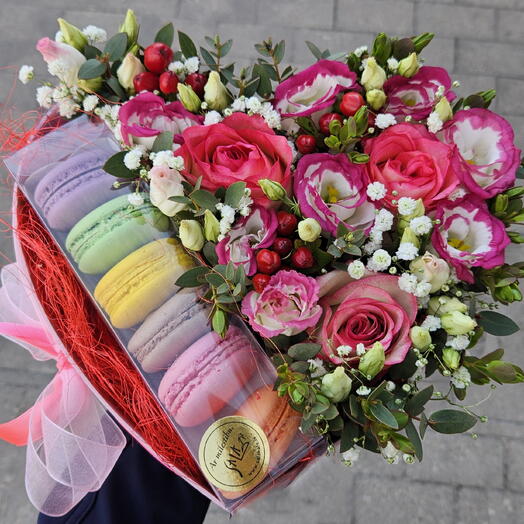 Flowers in a box with macaroons