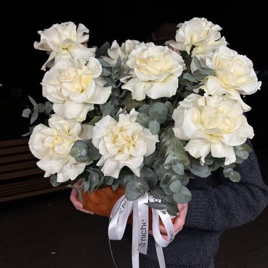 White French roses in a basket