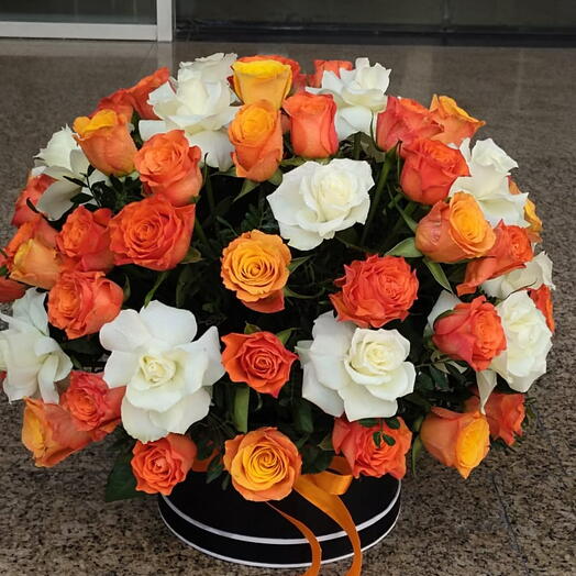 50 stems of mix roses in a round box