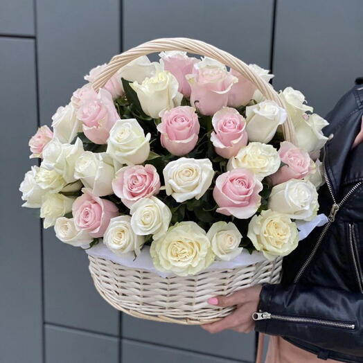 Basket of white and pink roses From the first look