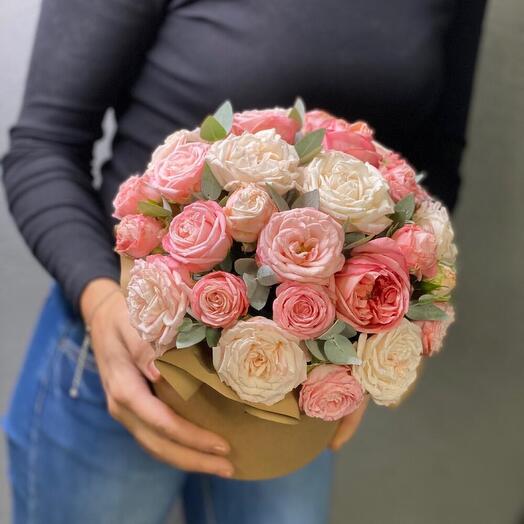 Flowers in a box with fragrant eucalyptus