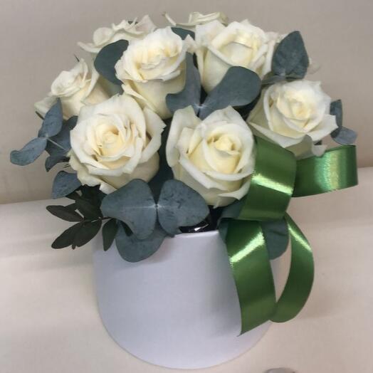 Composition of roses and eucalyptus