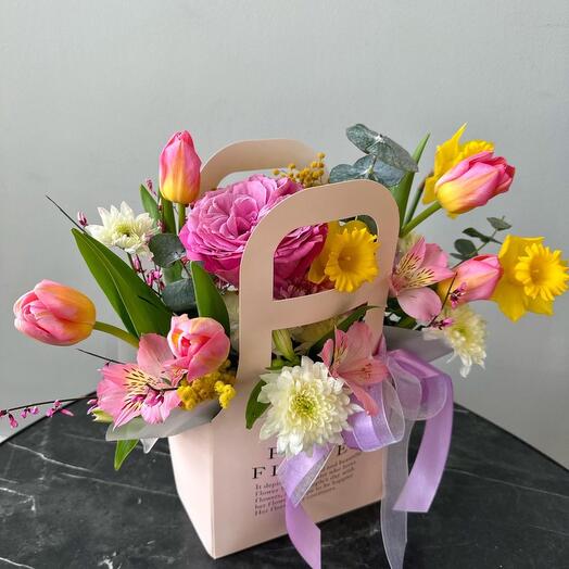 Spring mix in a handbag