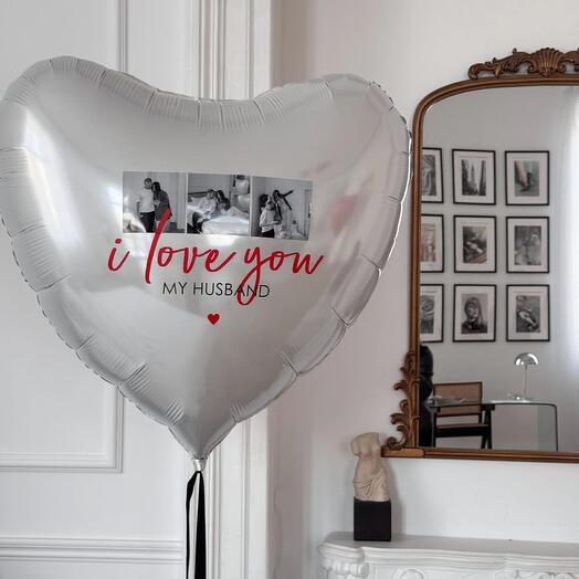 Large white heart with inscription and photos