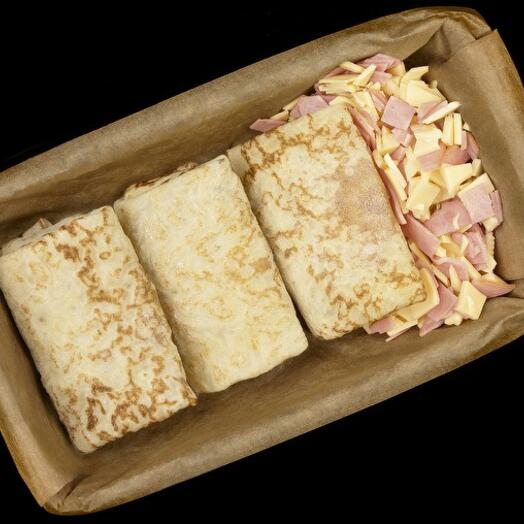 Homemade shock-frozen pancakes with cheese and ham