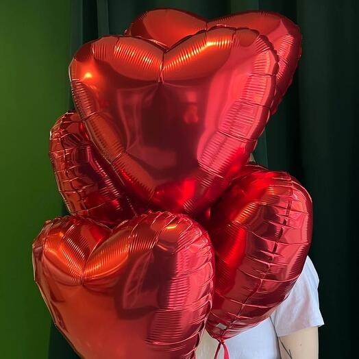 An armful of balls/red hearts