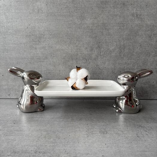 Saucer stand with rabbits