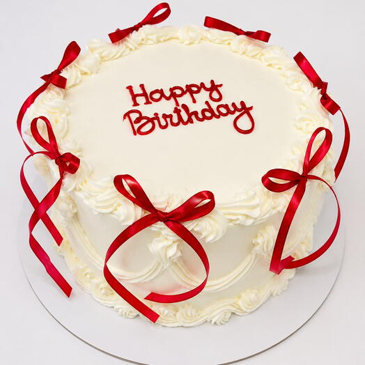 Торт «Happy Birthday» с красными бантами