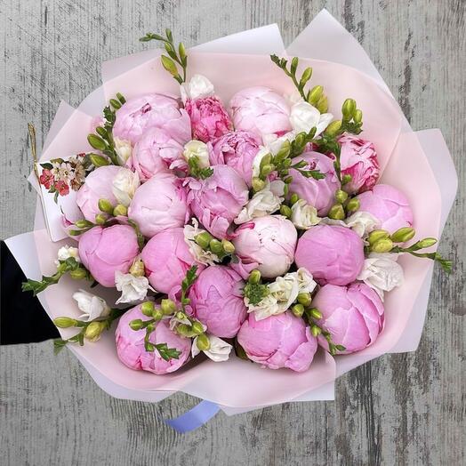 Bouquet of peonies with freesia