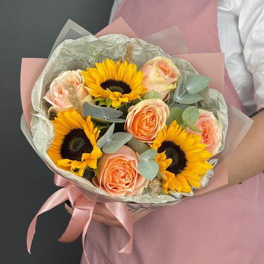Bouquet of flowers. Sunflowers and peach peony-shaped Roses