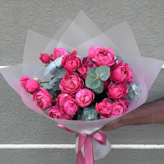 Bouquet of peony roses with eucalyptus