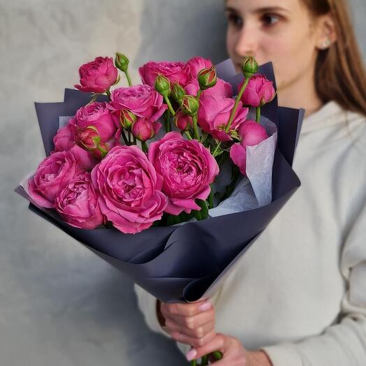 Bouquet of bush roses in designer packaging