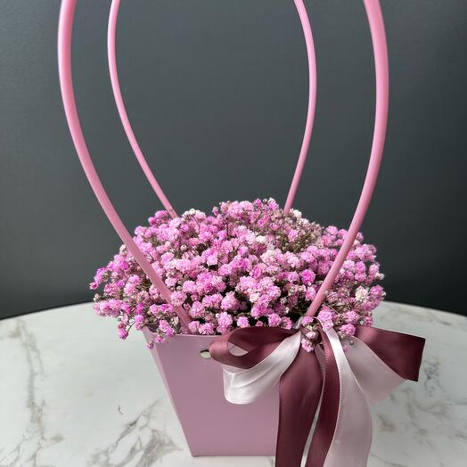 Flowers in a bag with a pink gypsophila