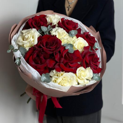 Delicate red and white roses with eucalyptus