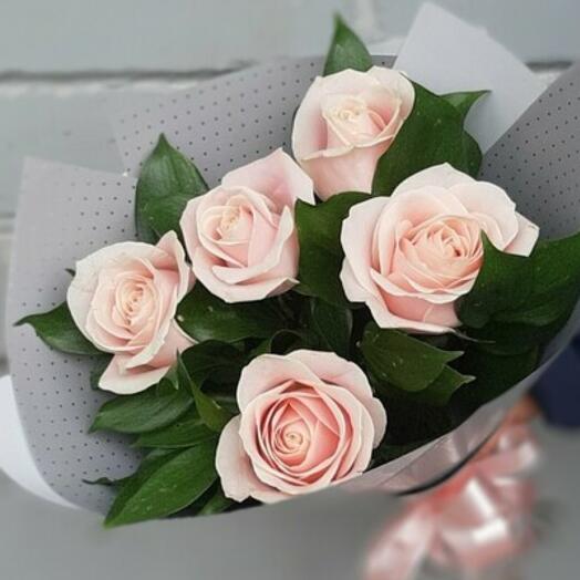 Bouquet of delicate pink roses with decoration