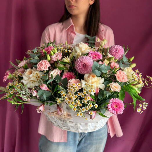 Basket with flowers and French roses