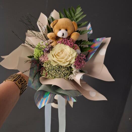 Teddy bear with rose