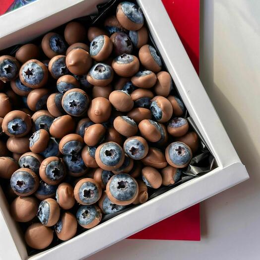 Box of blueberries in chocolate