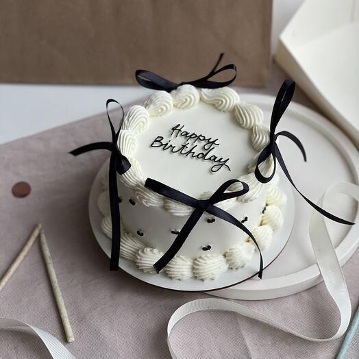 Happy birthday bento cake with black bows
