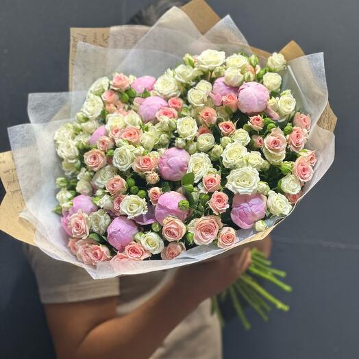 Peonies with bush roses